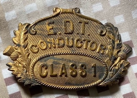 Edinburgh and District Tramways Company Conductor cap badge