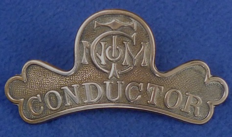 North Metropolitan Tramways cap badge