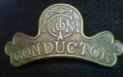 North Metropolitan Tramways cap badge