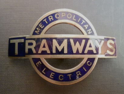 Metropolitan Electric Tramways bullseye cap badge